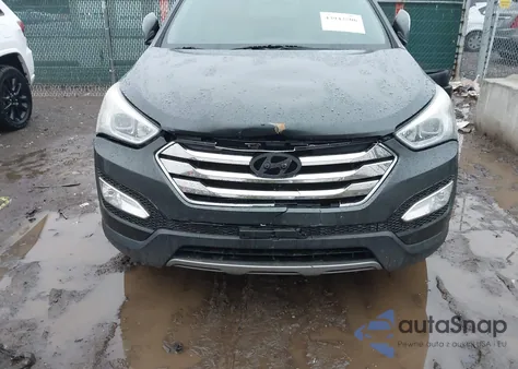 2014 Hyundai Santa Fe Sport 2.4L z USA, uszkodzony, nr VIN 5XYZU3LB4EG193720